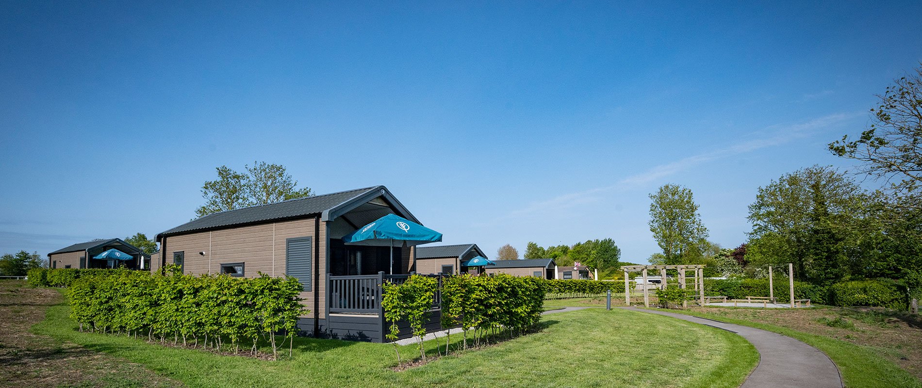 glamping cabins in a field