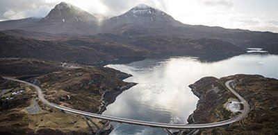 Winding bridge of Kylesku across a large lake 