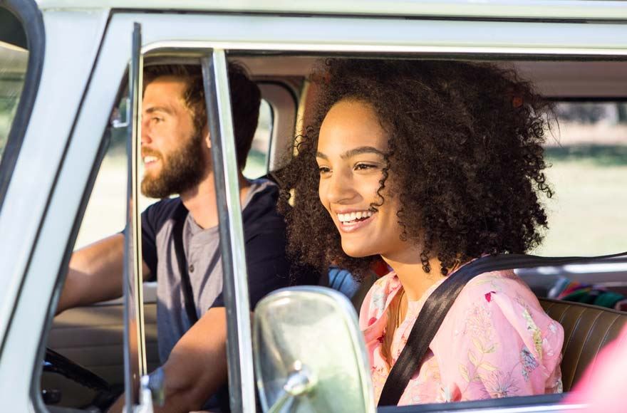 Young couple getting to grips with their motorhome