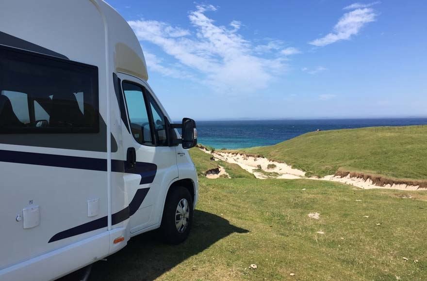 Motorhome overlooking seaside at John O'Groats, Scotland