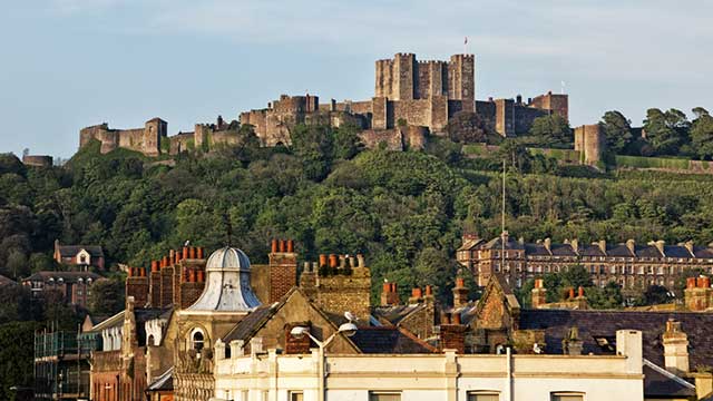 Dover Castle overlooking the town below