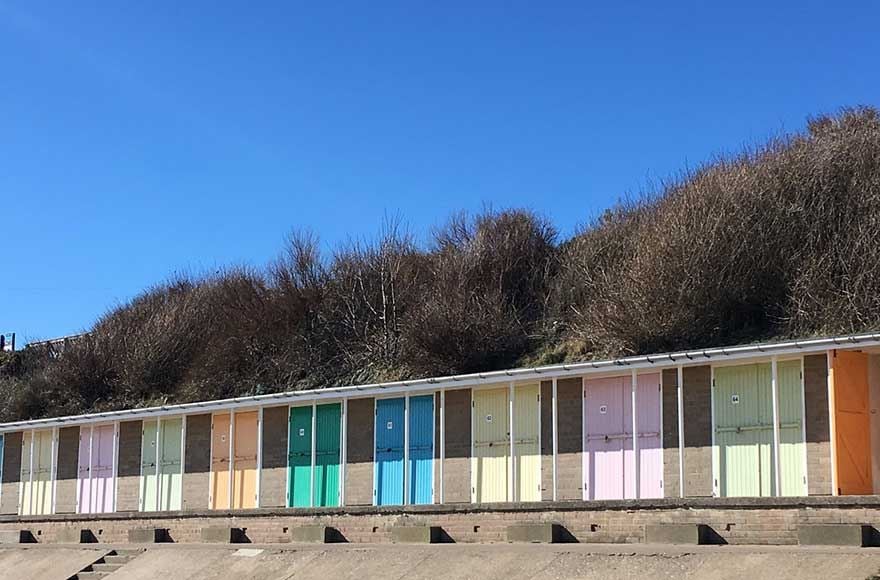 Brightly coloured beach huts along Bridlington sea front