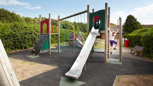 Children enjoying the Brighton Club Campsite playground