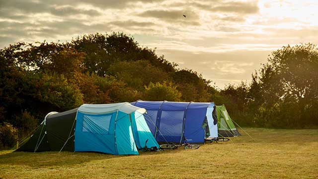 Tents against a moody sky at Daleacres Club Campsite