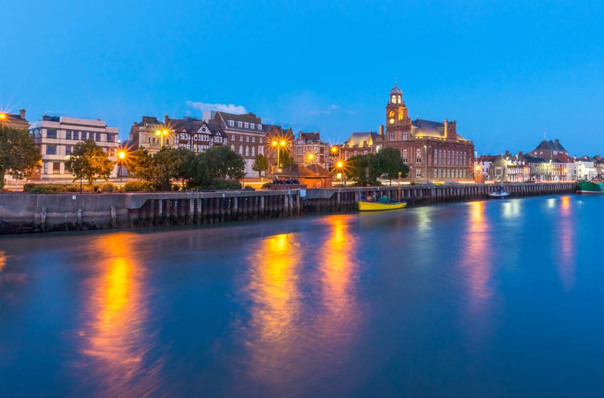 Great Yarmouth Quay with the lights coming on at dusk