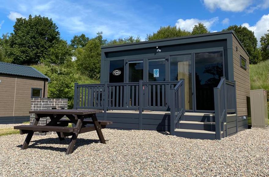 Glamping pod at Troutbeck Head with picnic table outside