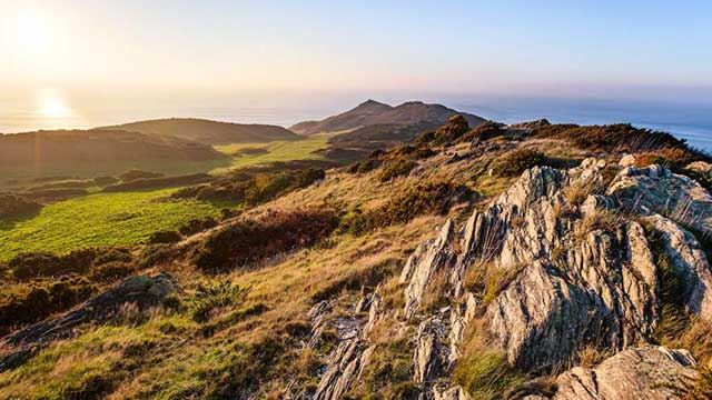 Morte Point, a rocky clifftop walk in the late afternoon sun