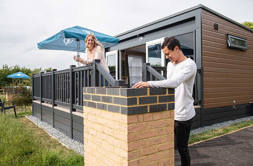 using the bbq outside the glamping pod