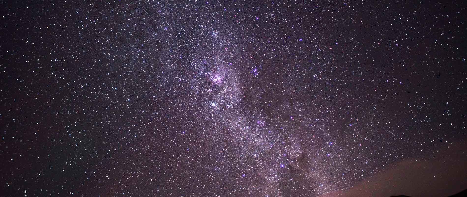 stary night sky with purple hue