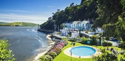 Houses and swimming pool along coast of Portmeirion