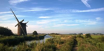 Windmill next to the lake in the Norfolk broads