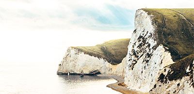 rocky white chalk cliffs of Durdle door